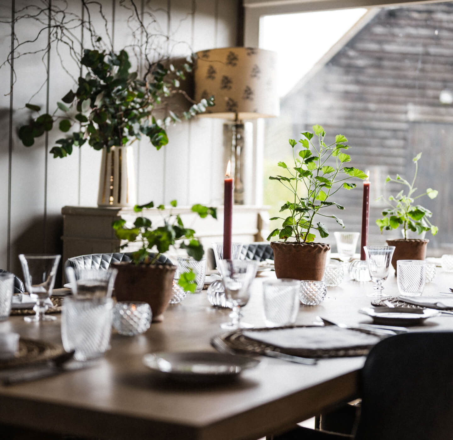 A set dining table at Barnsgrove, Hampshire