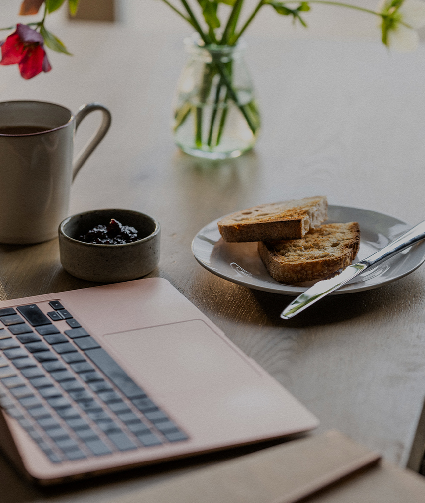 Laptop and breakfast spread at Barnsgrove, Hampshire